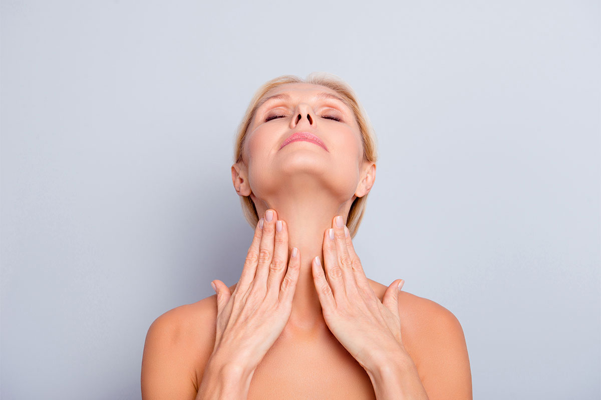 A woman after her neck liposuction in Kitchener-Waterloo